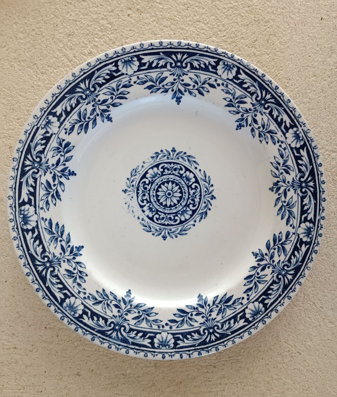 2 mismatched ironstone plates