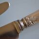 12 silver metal table knives 25.5 cm
