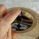Vintage push-button ashtray from the 70s – Black and brass – With shelf