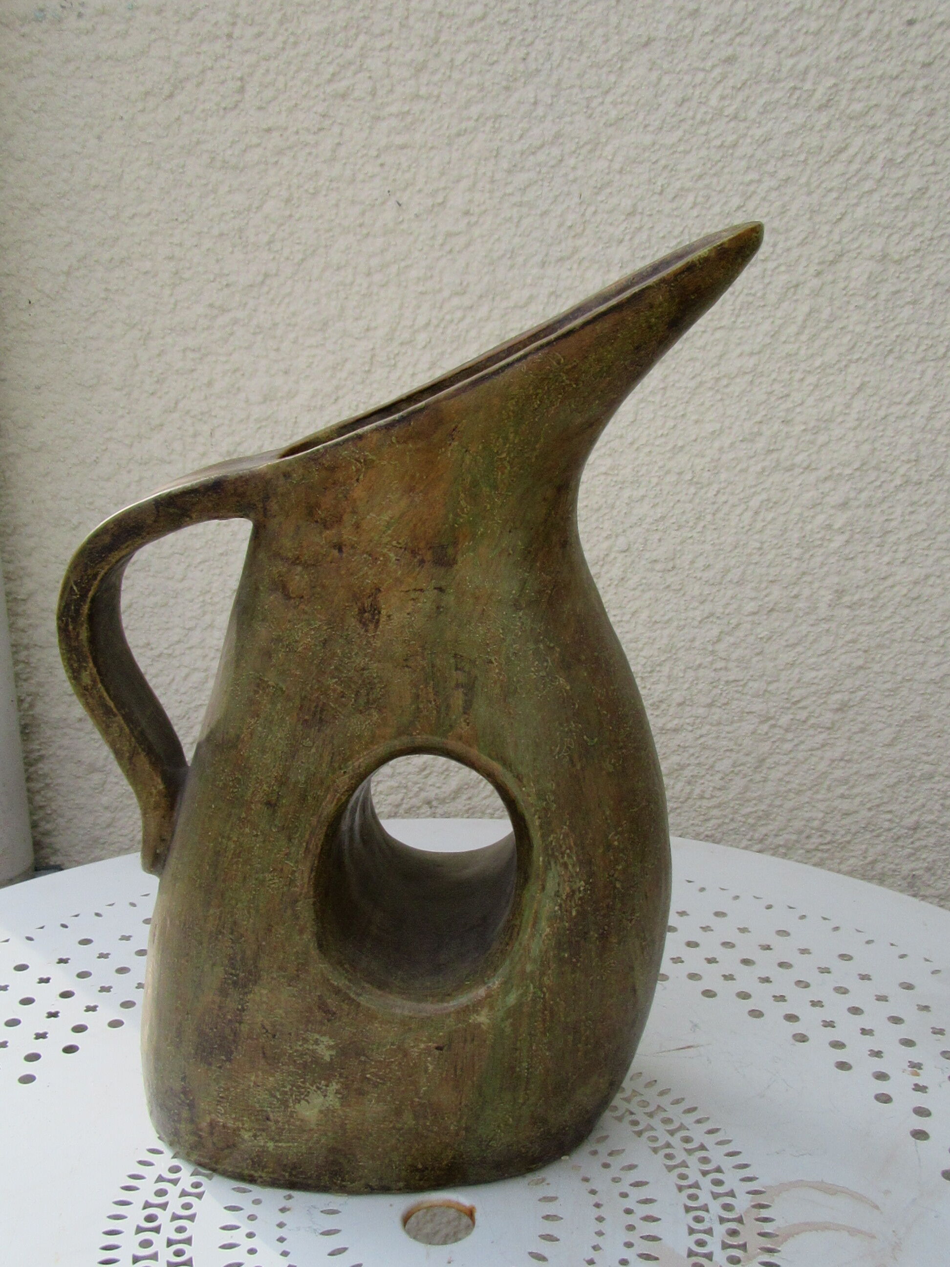 Glazed earthenware pitcher
