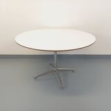 Vintage Eames round table for Vitra in white melamine, wood, and metal.