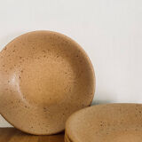 4 hollow plates in speckled stoneware