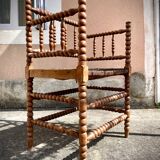 Antique Bobbin armchair with straw seat