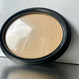 Oval bakelite black vintage frame with convex glass