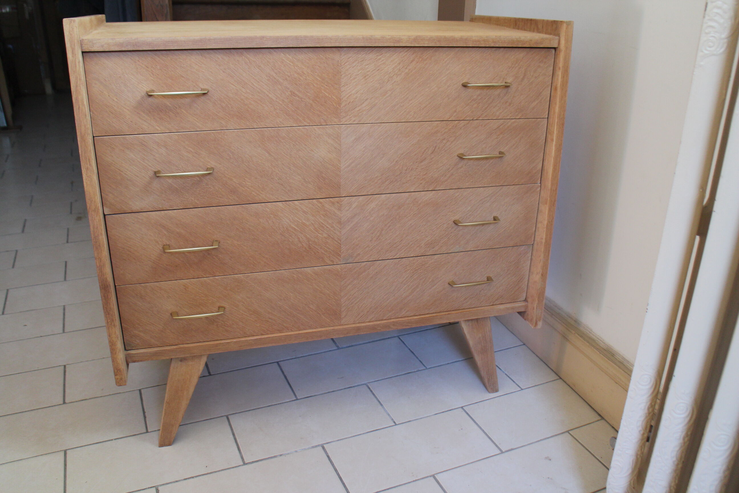 Chest of drawers with compass feet in raw wood