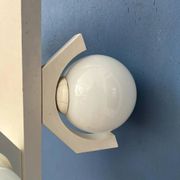 Mid-century white suspension with a bony design and opaline glass shade.