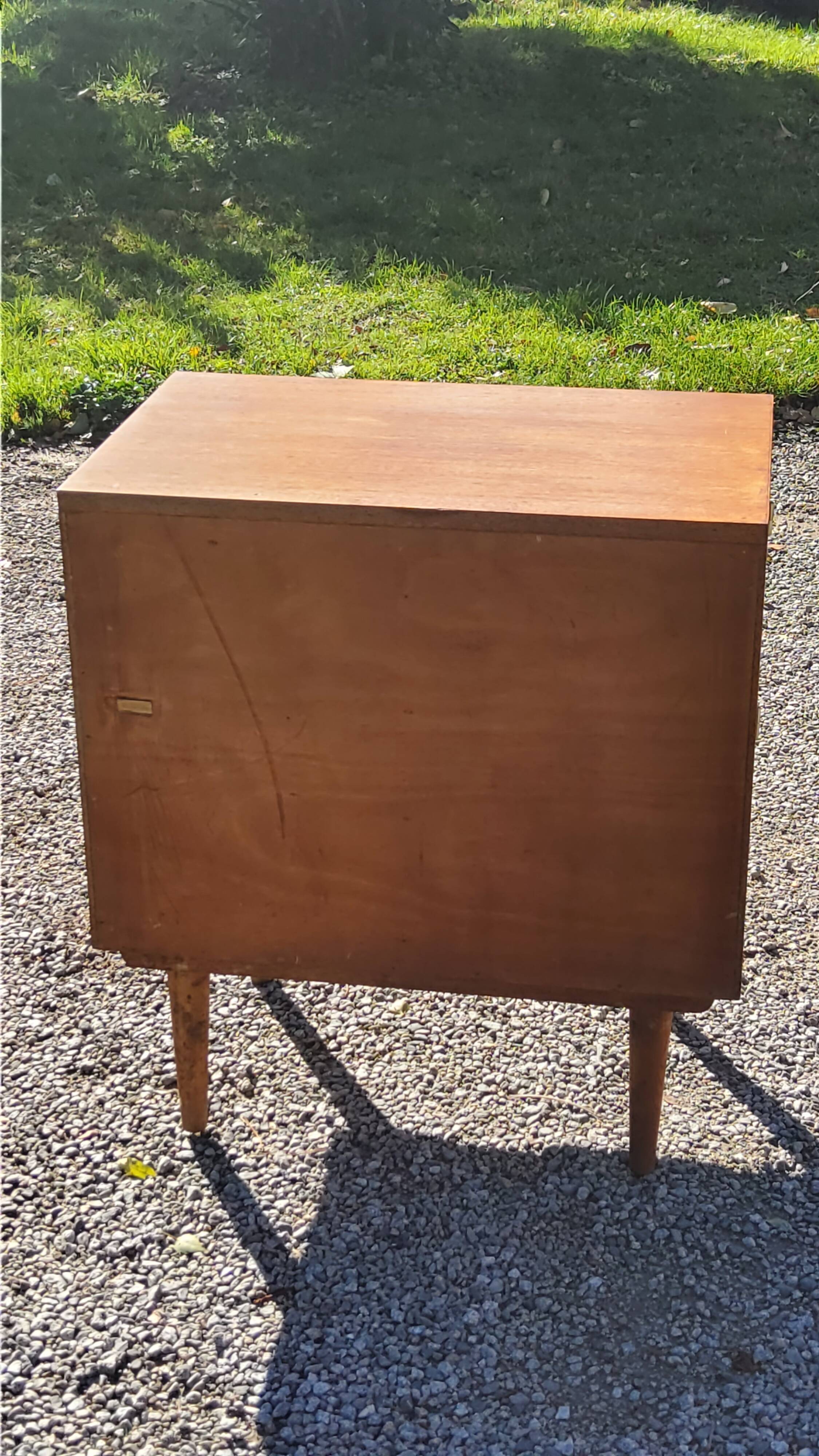 Vintage golden oak sideboard with conical legs from the 1950s