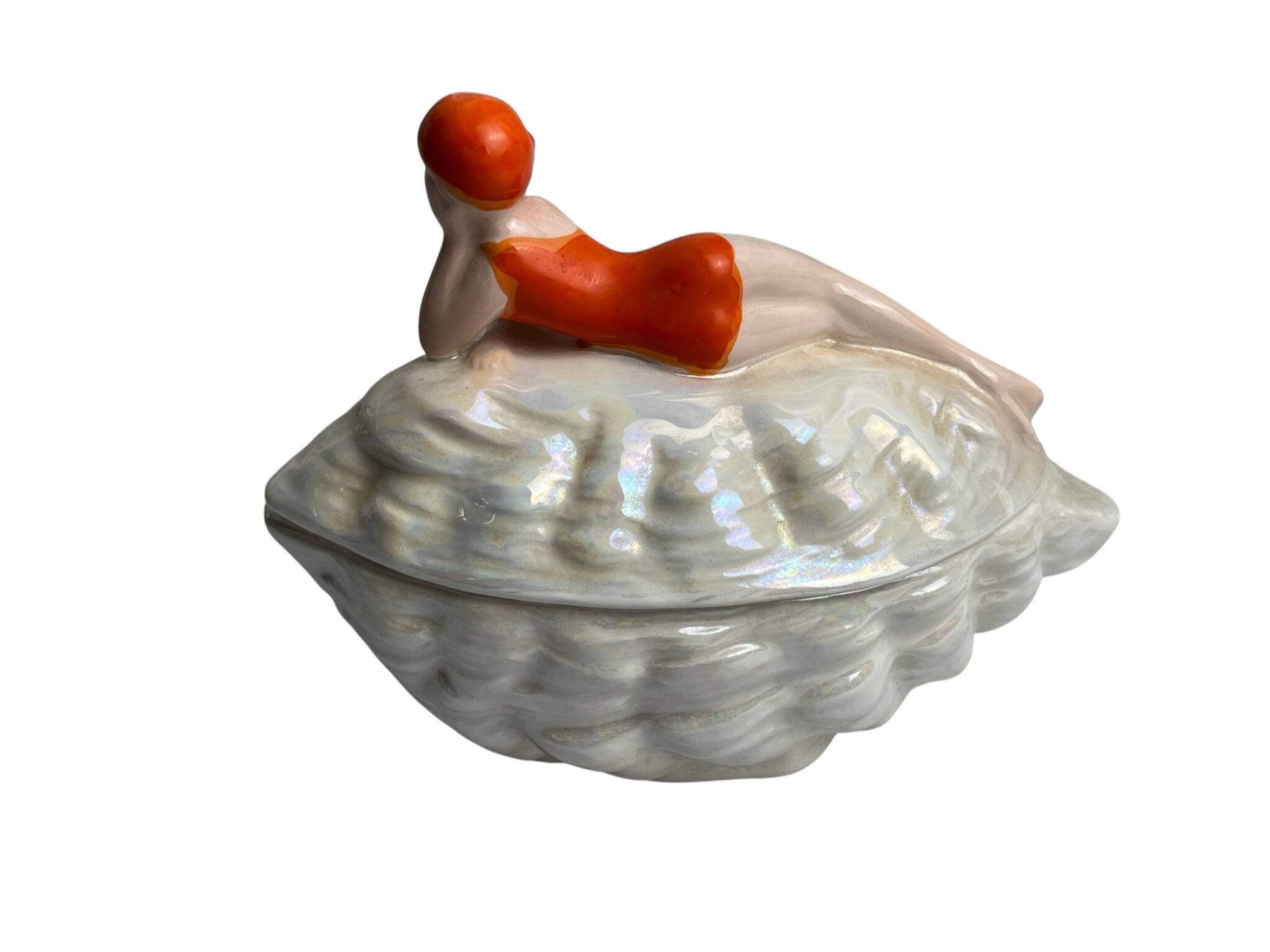 Art Deco, empty candy box, bathing figure, and porcelain shell from the 20th century.