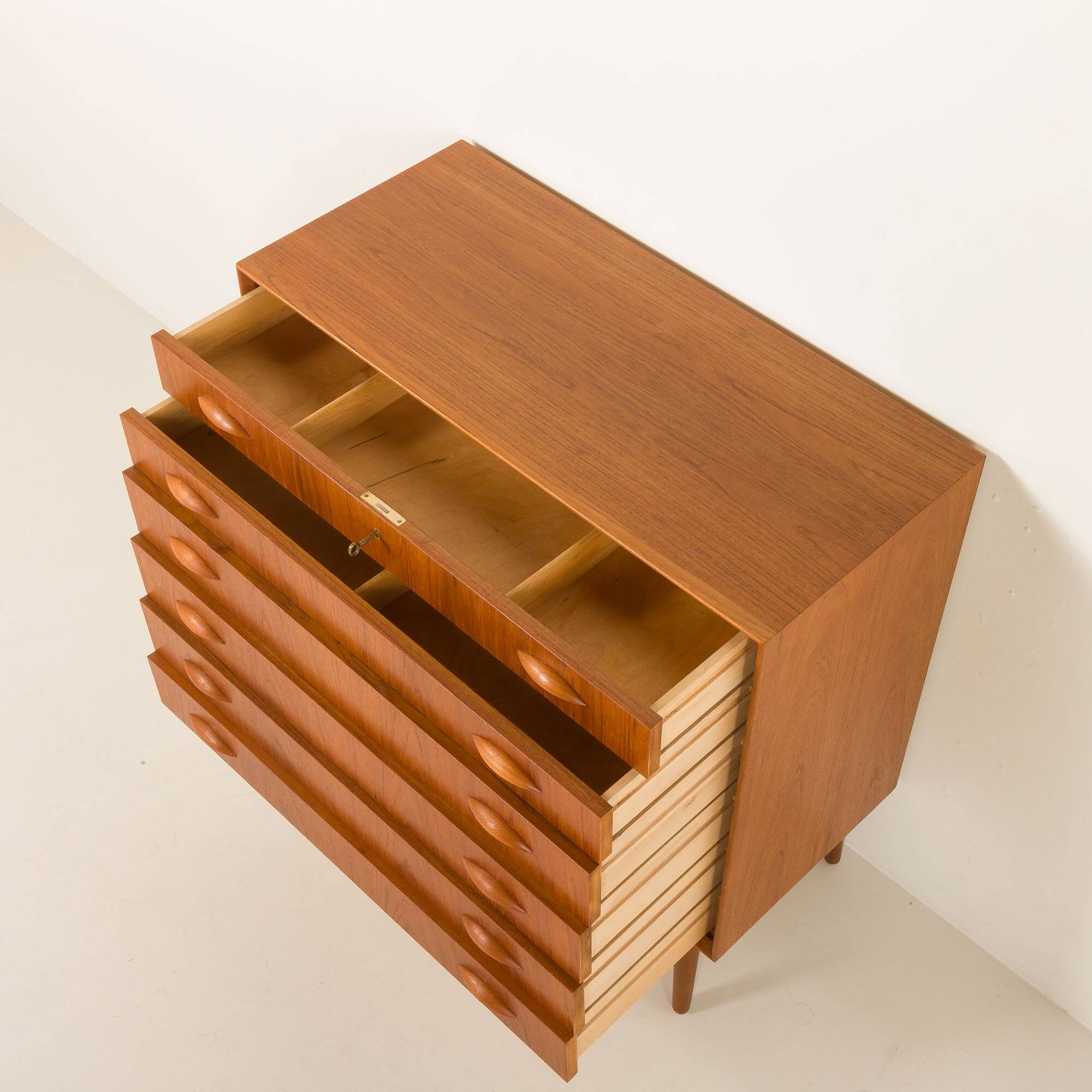 Scandinavian teak chest of drawers by Johannes Sorth for Nexo Mobelfabrik.
