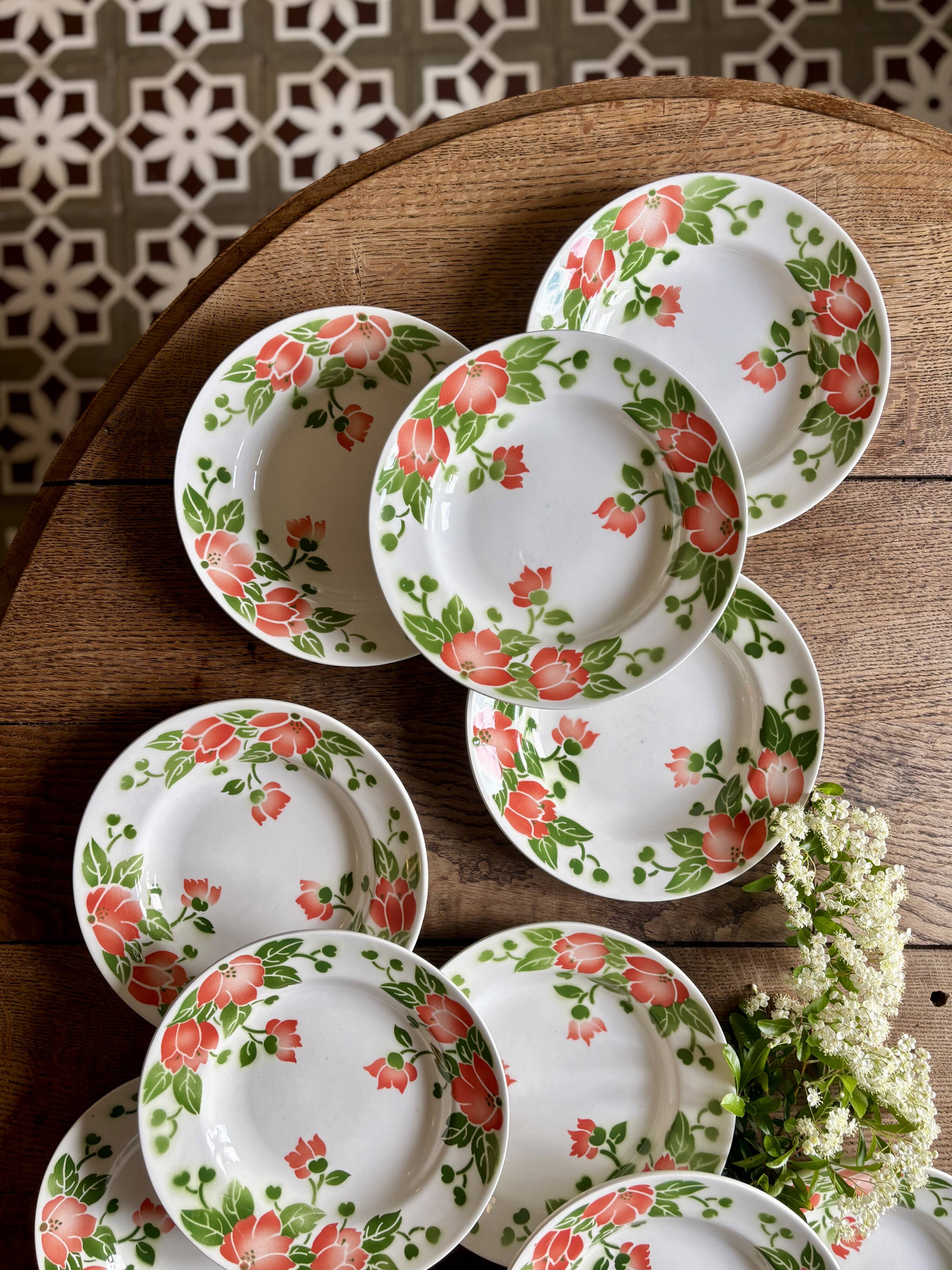 Set of 11 vintage deep plates by Eric de Moulin des Loups.