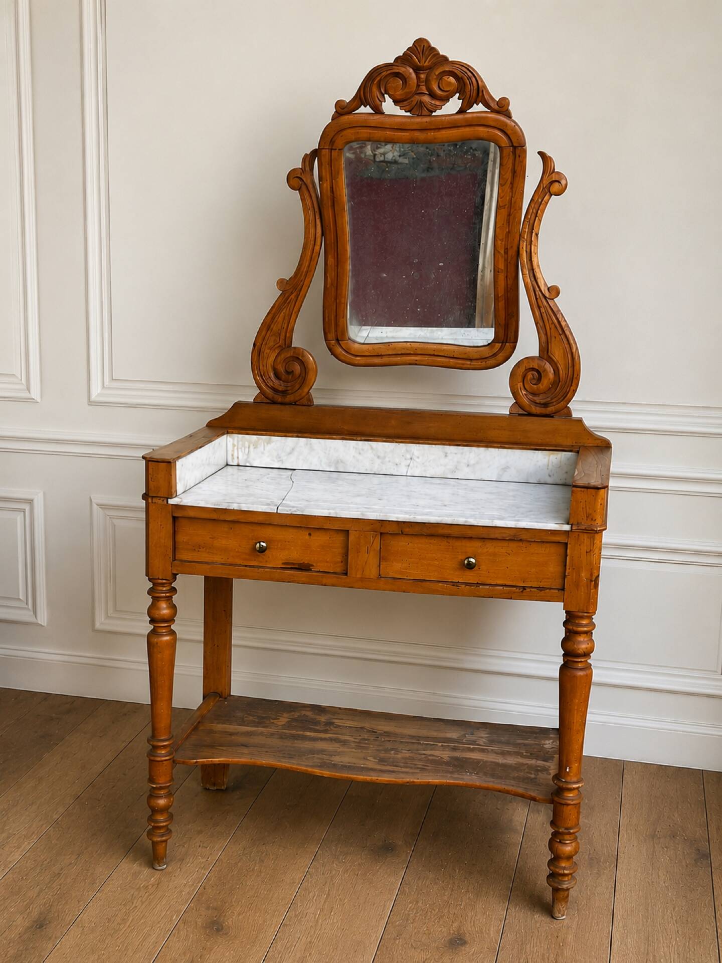 Walnut and marble dressing table, mercury mirror, circa 1850.