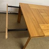 Table à manger extensible en orme massif par la Maison Regain