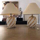 Pair of lamps of the brand Koska in white and twisted gold, with lampshade