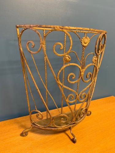 Coats and old umbrella holder