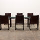 Tito Agnoli for Matteo Grassi leather dining table and six chairs