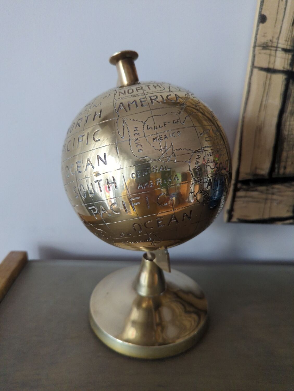 Vintage gilded brass world map