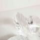 Empty floral pocket crystal of transparent arques signed