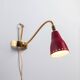 Brass wall lamp with perforated metal shade, 1950s, Sweden