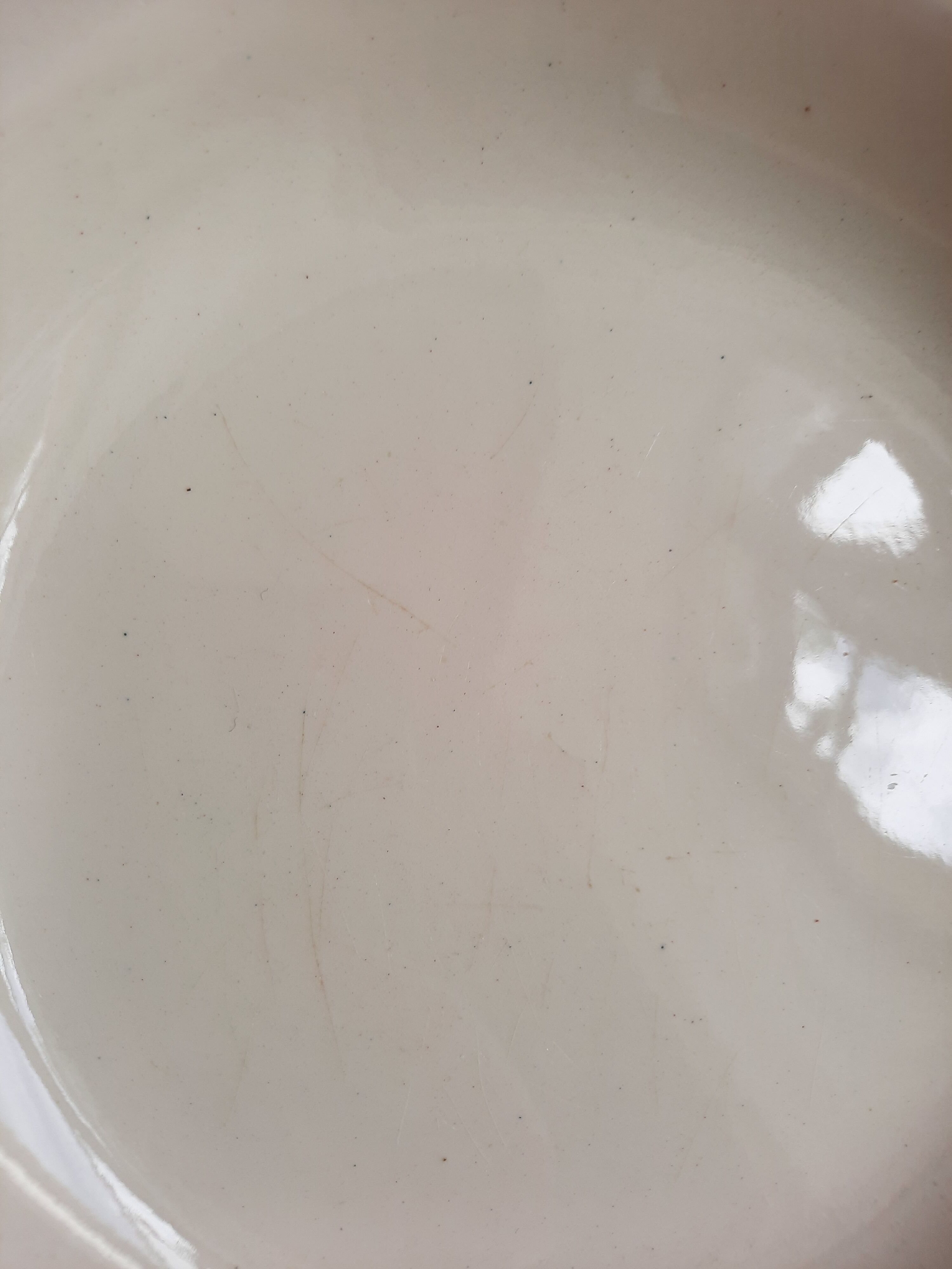 Flat, dessert, hollow plates and tureen in old earthenware