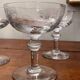 Set of 3 Art Deco engraved champagne glasses with arabesque design.
