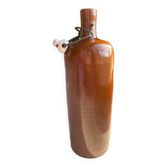 Old hot water bottle in glazed stoneware