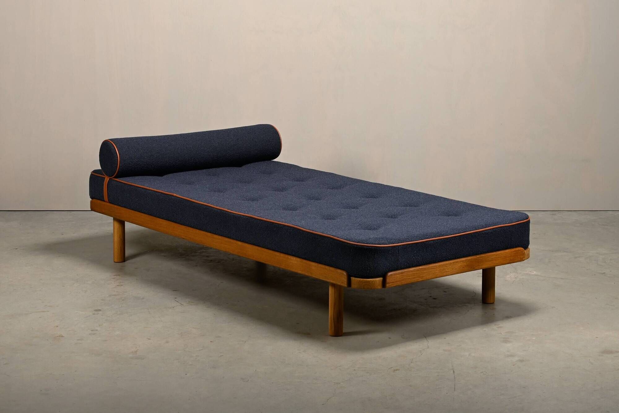 Scandinavian Daybed in Oak and dark Blue bouclé fabric with Leather accents