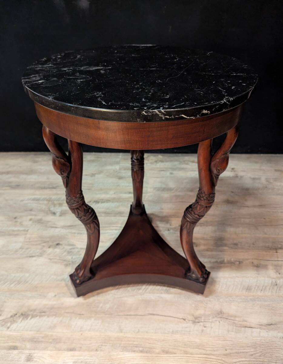 Empire style mahogany tripod pedestal table with swan neck legs