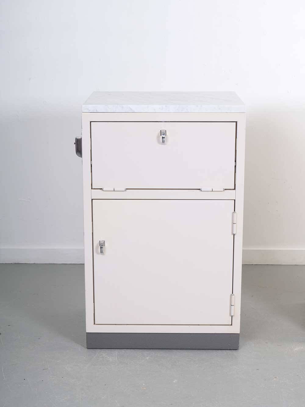 Set industrial cabinets with marble top.
