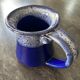 Small enamelled earthenware milk jug