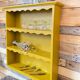 Renovated old saffron wall shelf
