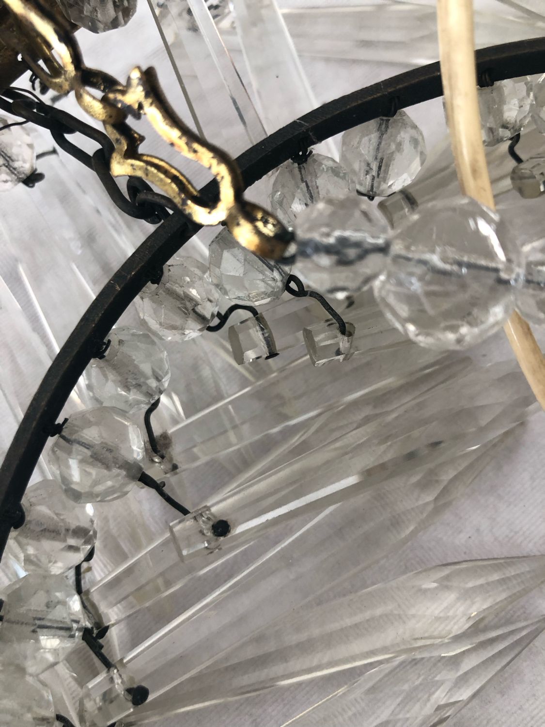 Vintage tassel chandelier has 2 glass and brass crowns