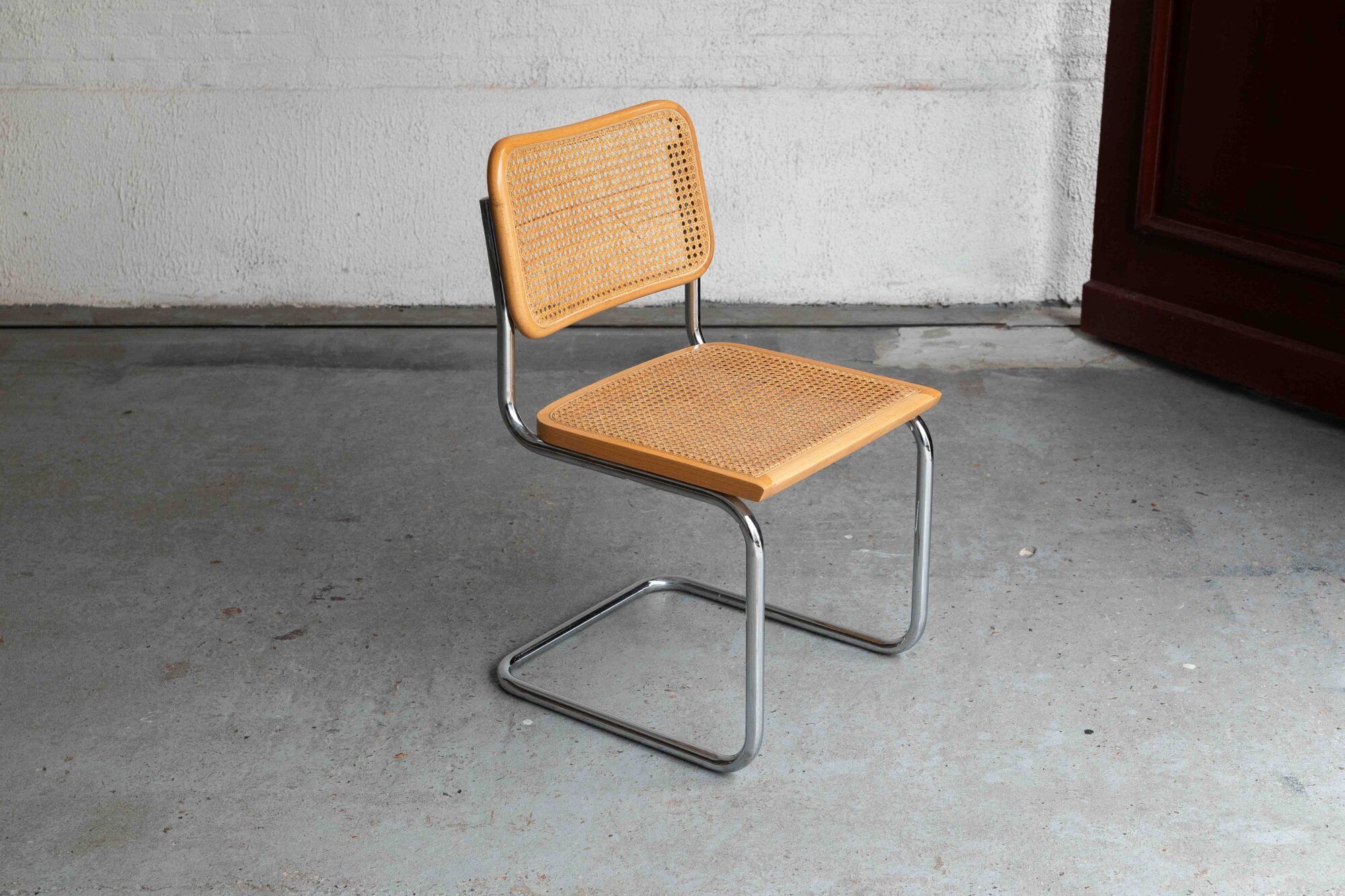 Set of 7 'Cesca' dining chairs by Marcel Breuer.