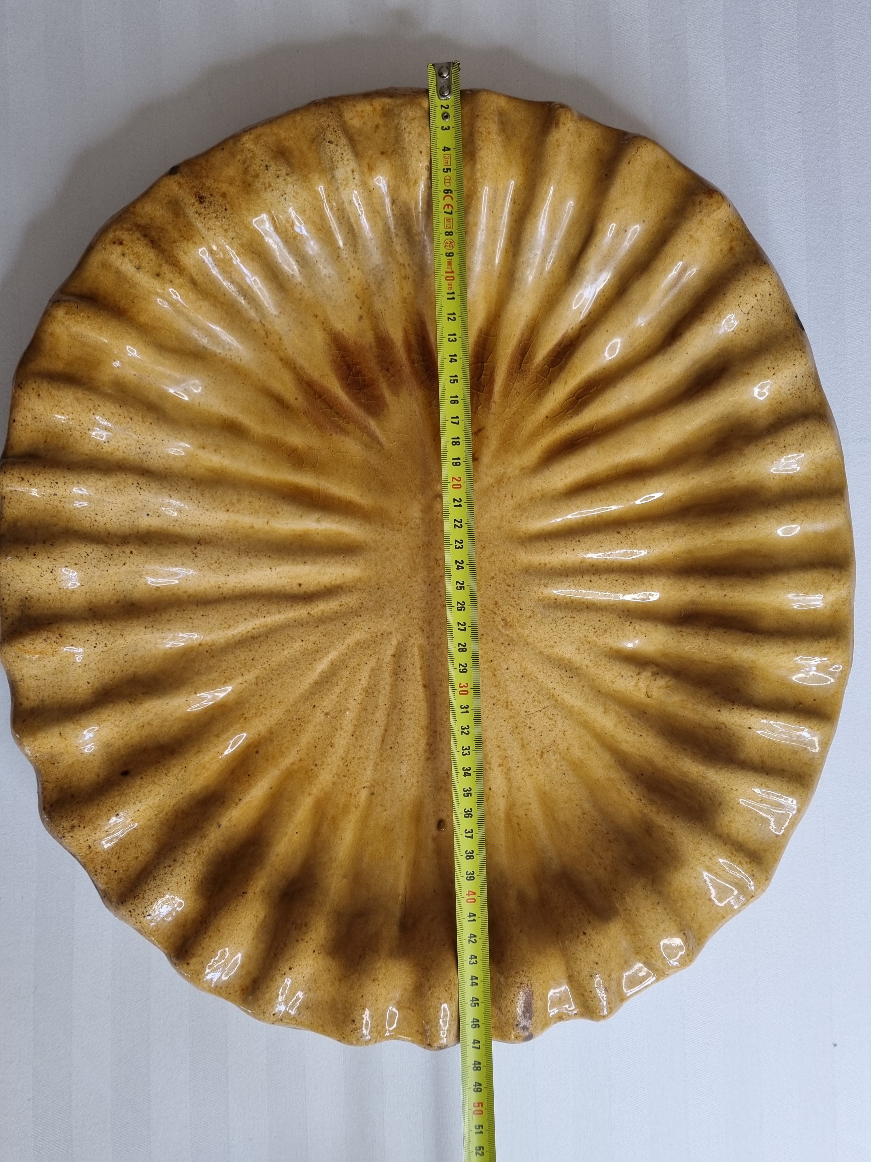 Large dish in enamelled terracotta, ochre, 47 cm
