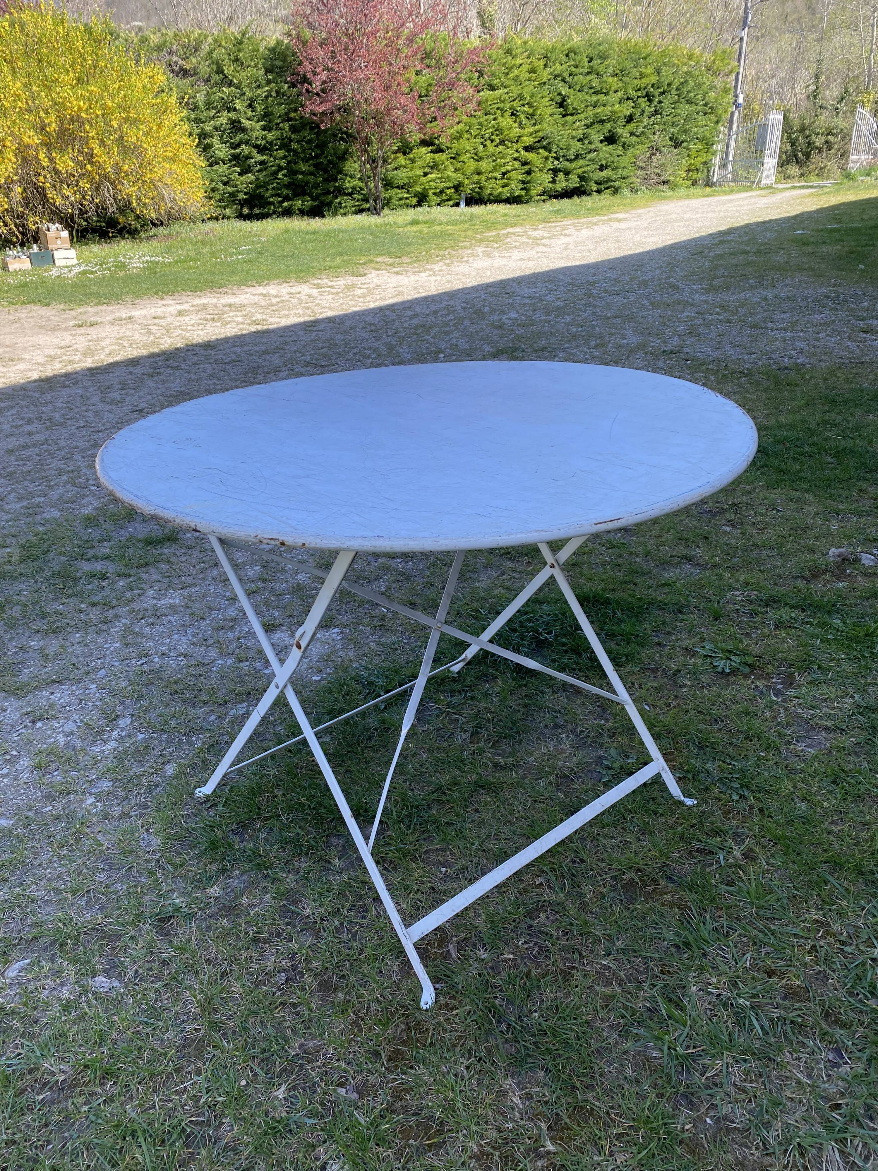 Round folding metal table – circa 1950