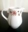 Milk jug with saucer