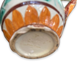 Monaco pourer with floral motifs