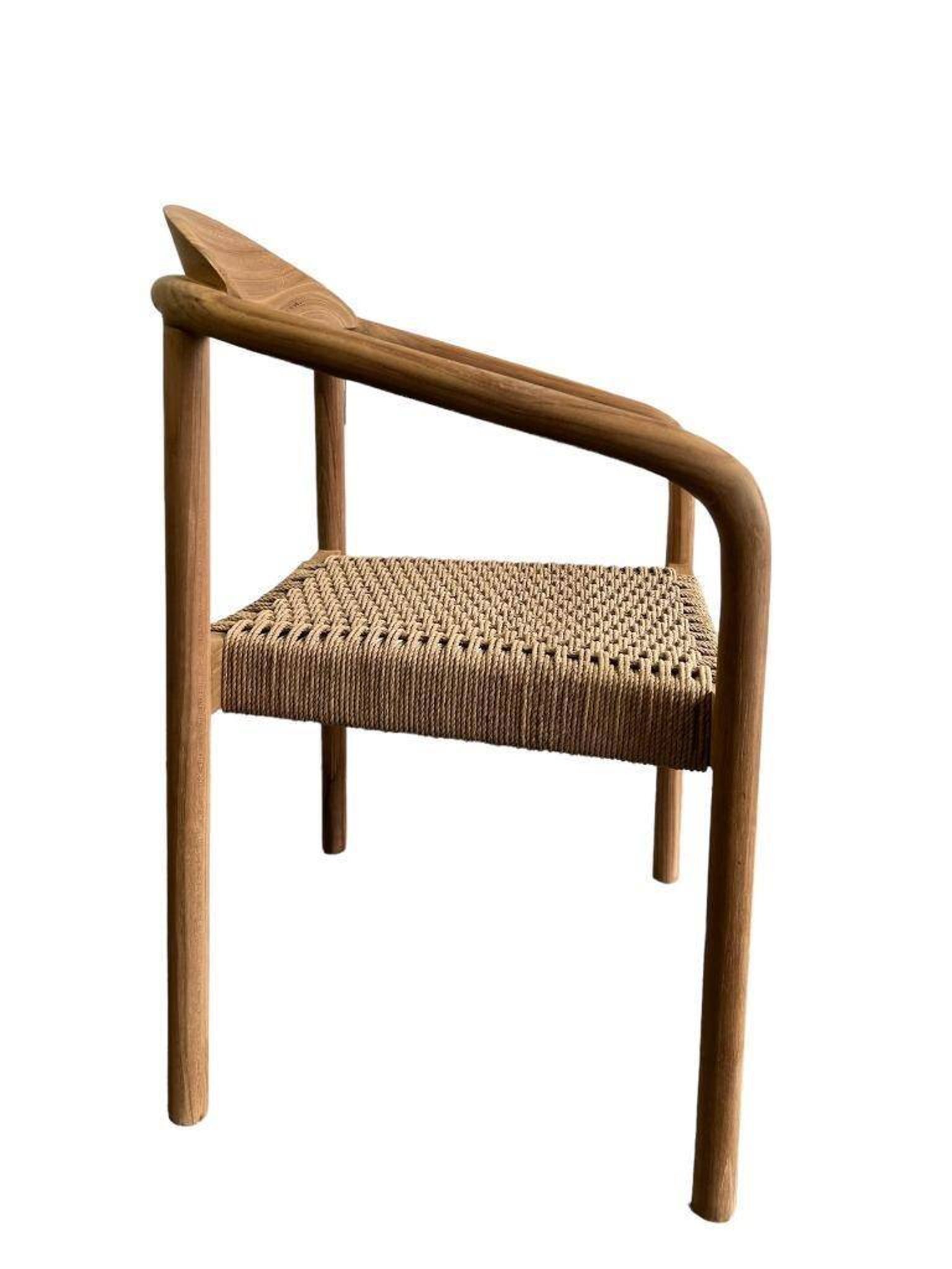 solid wood chair with woven seat and armrests