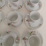 Haviland Limoges porcelain 10 coffee cups and 9 saucers with floral decoration.