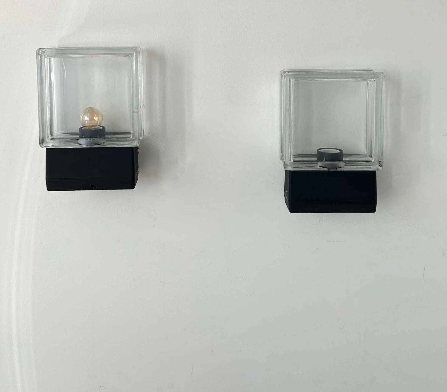Pair of vintage wall lights, glass and black metal, Italy 1980