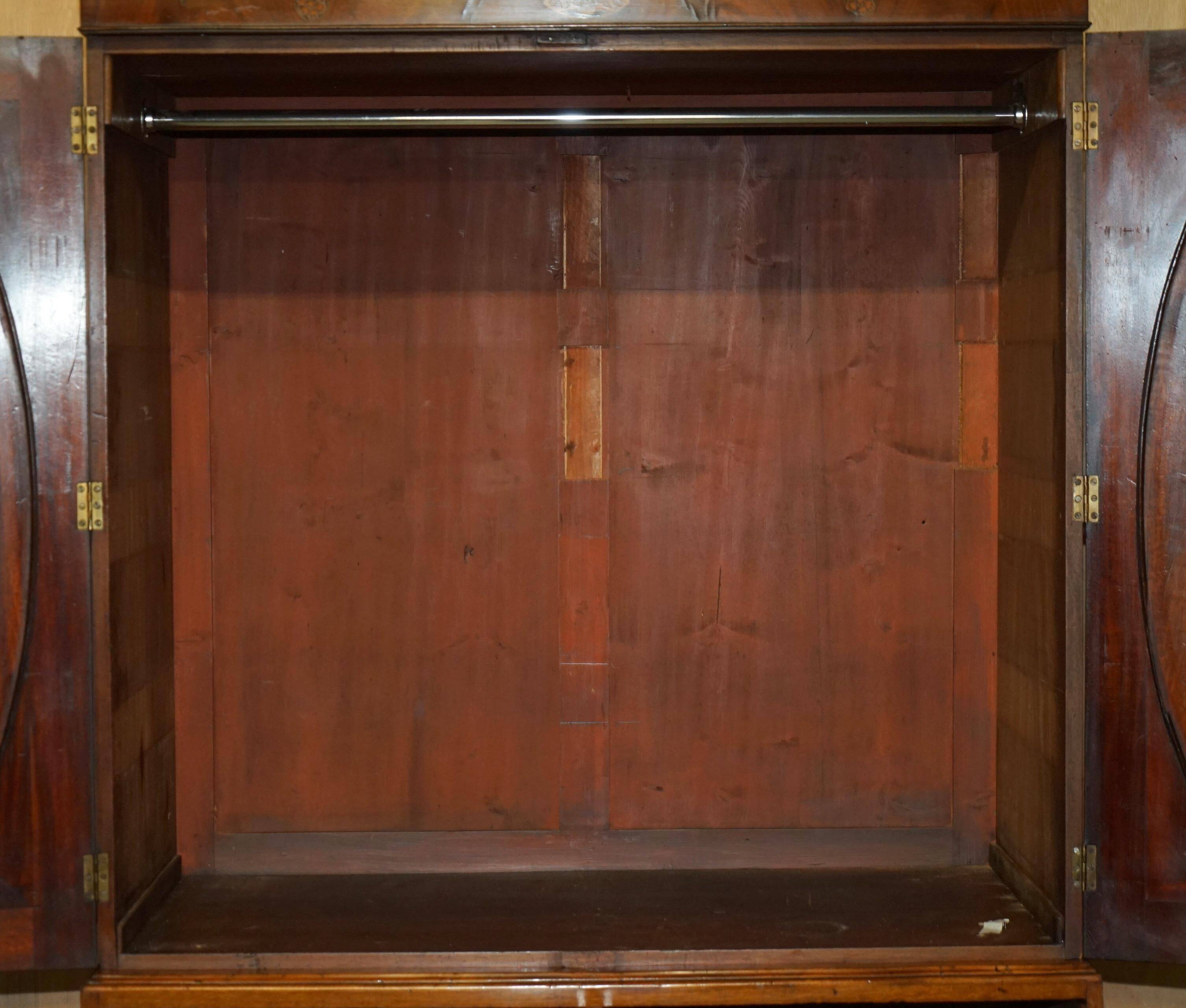 George III Sheraton linen cupboard in walnut, circa 1760.