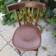 old bistro chair with varnished wooden bars