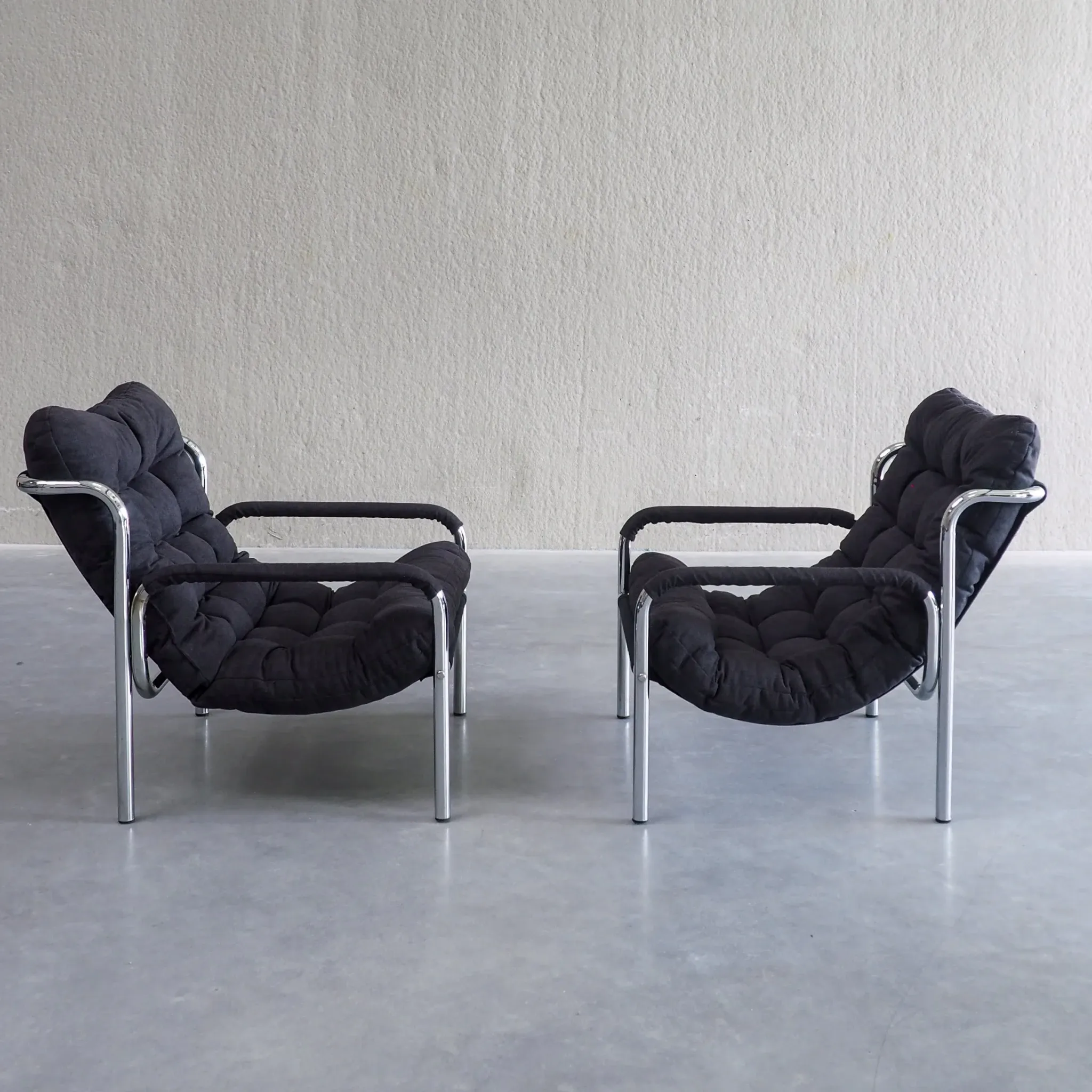 Pair of mid-century modern tubular lounge chairs