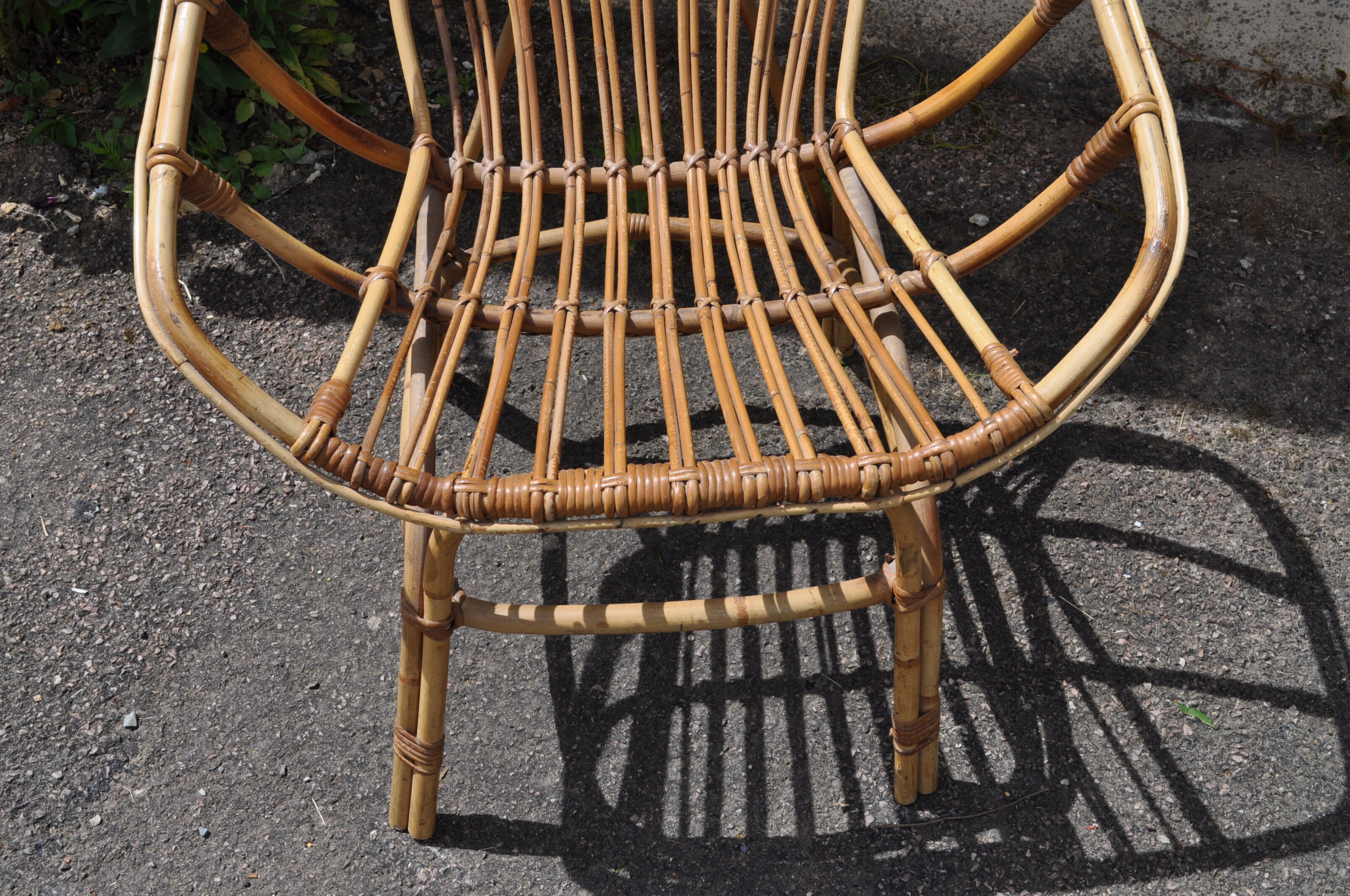 Rattan basket armchair.