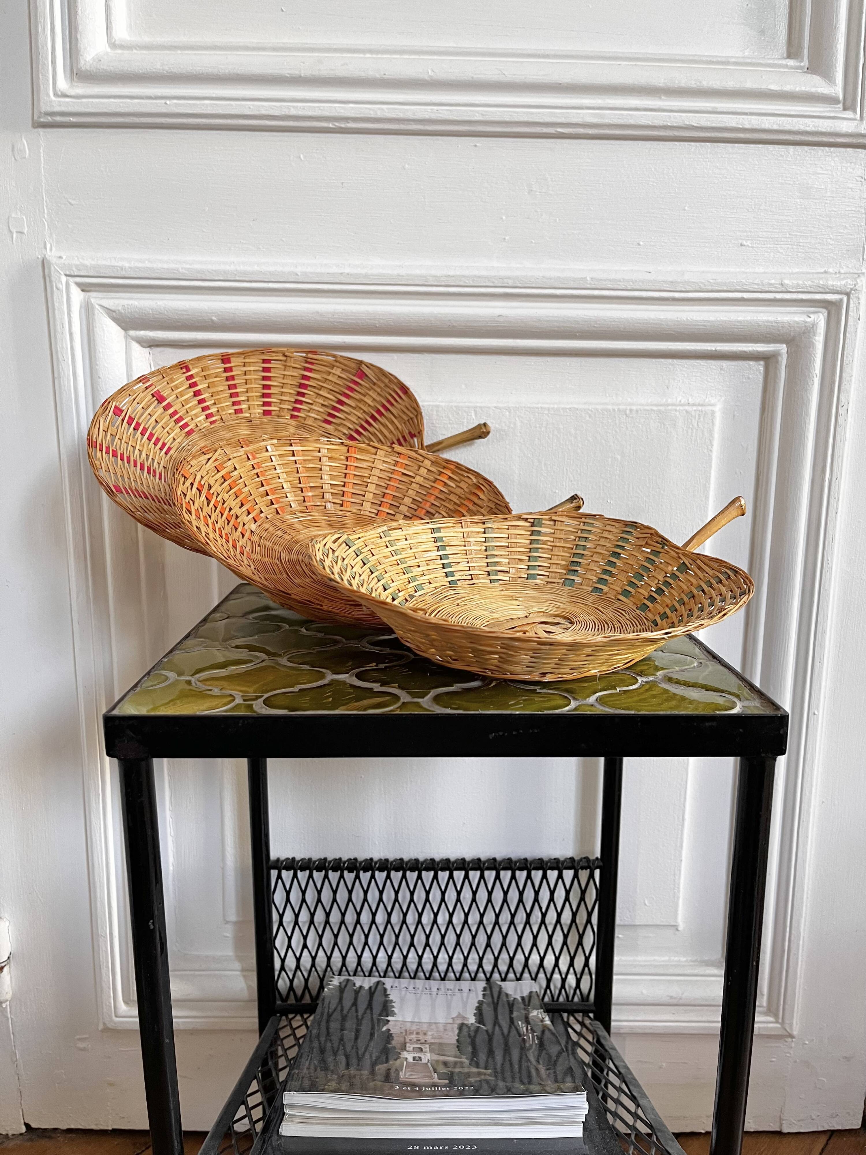 Trio of vintage wicker and bamboo baskets