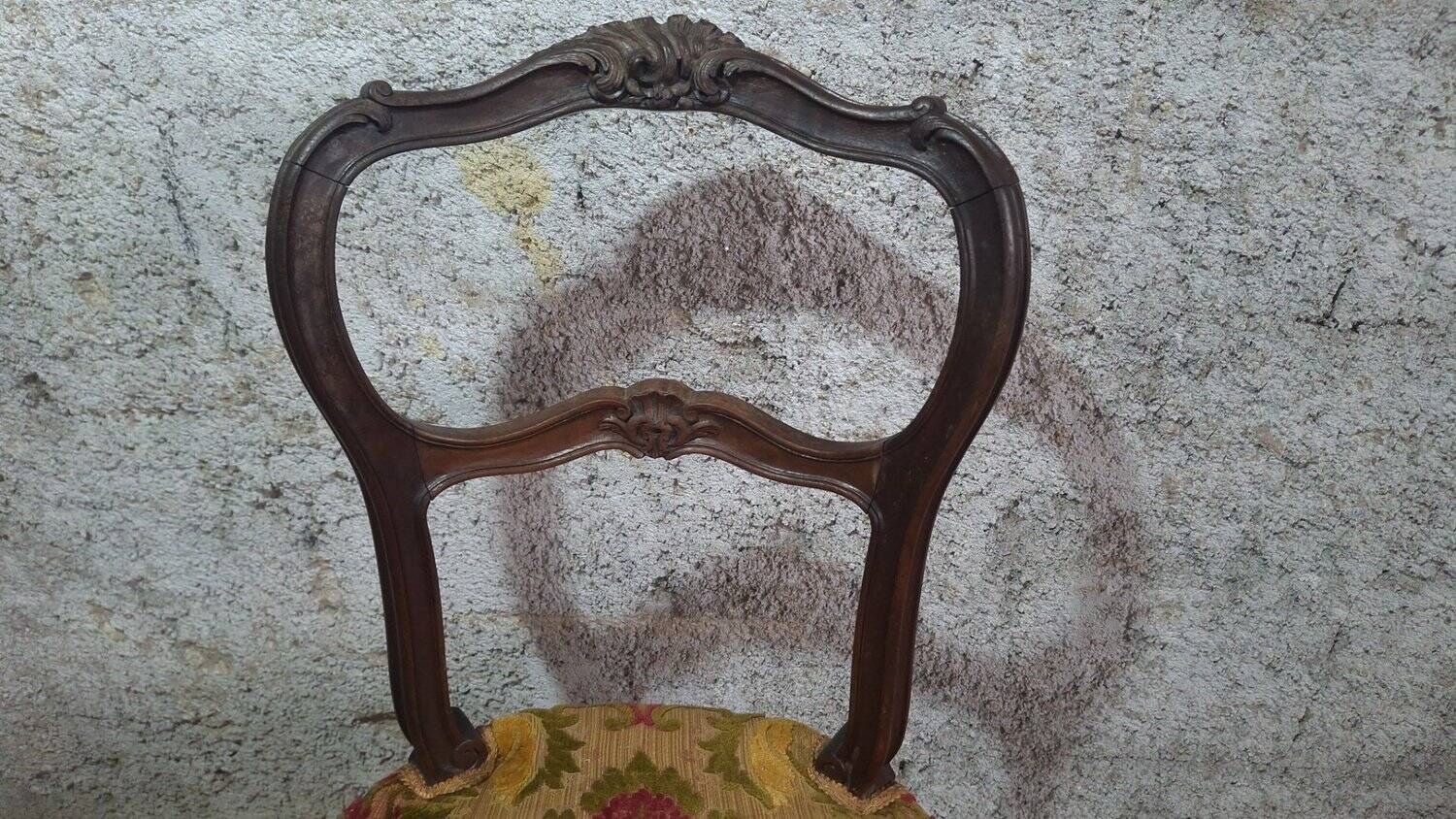 Carved walnut Napoleon III style velvet medallion chair