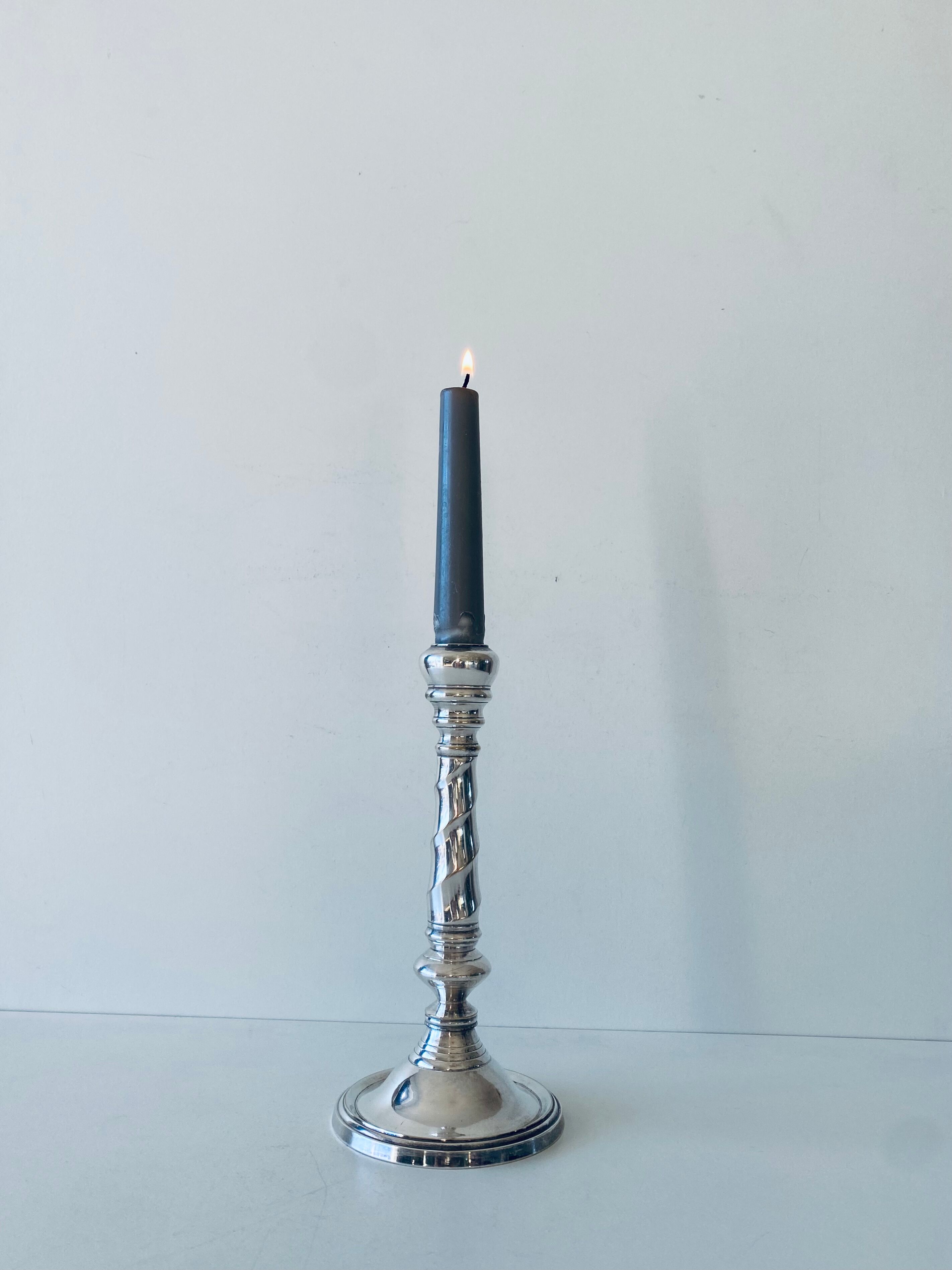 Twisted silver candle holder