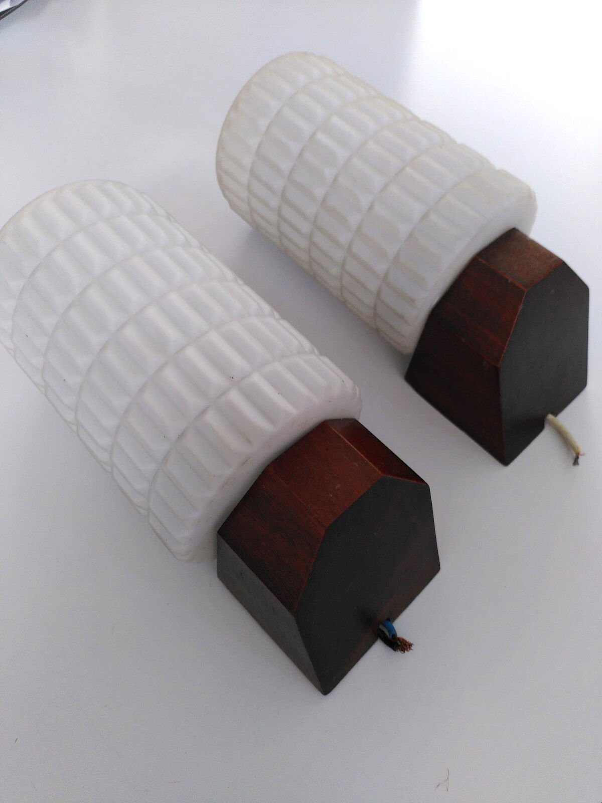 Opaline and teak sconces
