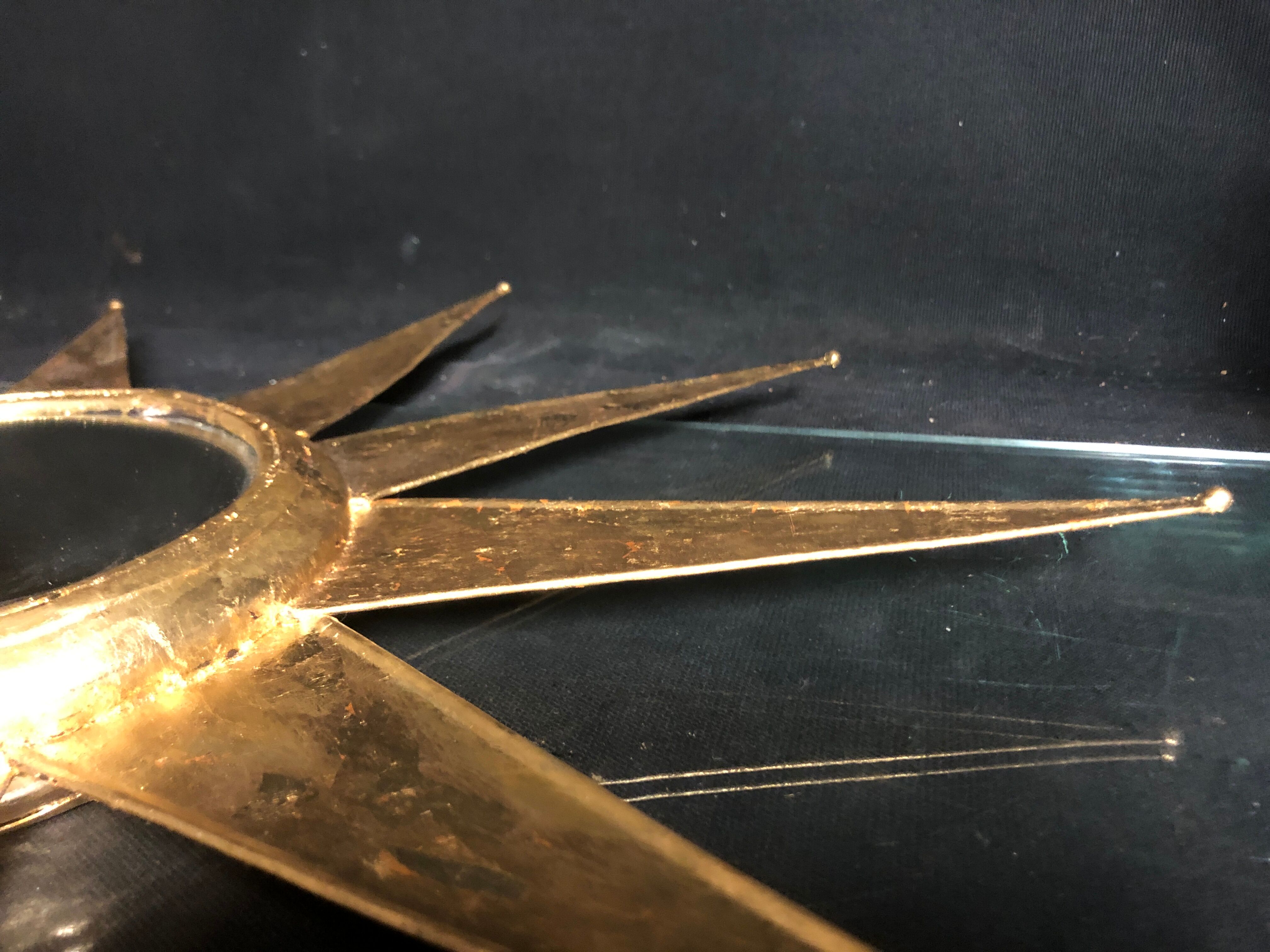 Mirror sun deforming 61 cm in gold metal with gold leaf said witch
