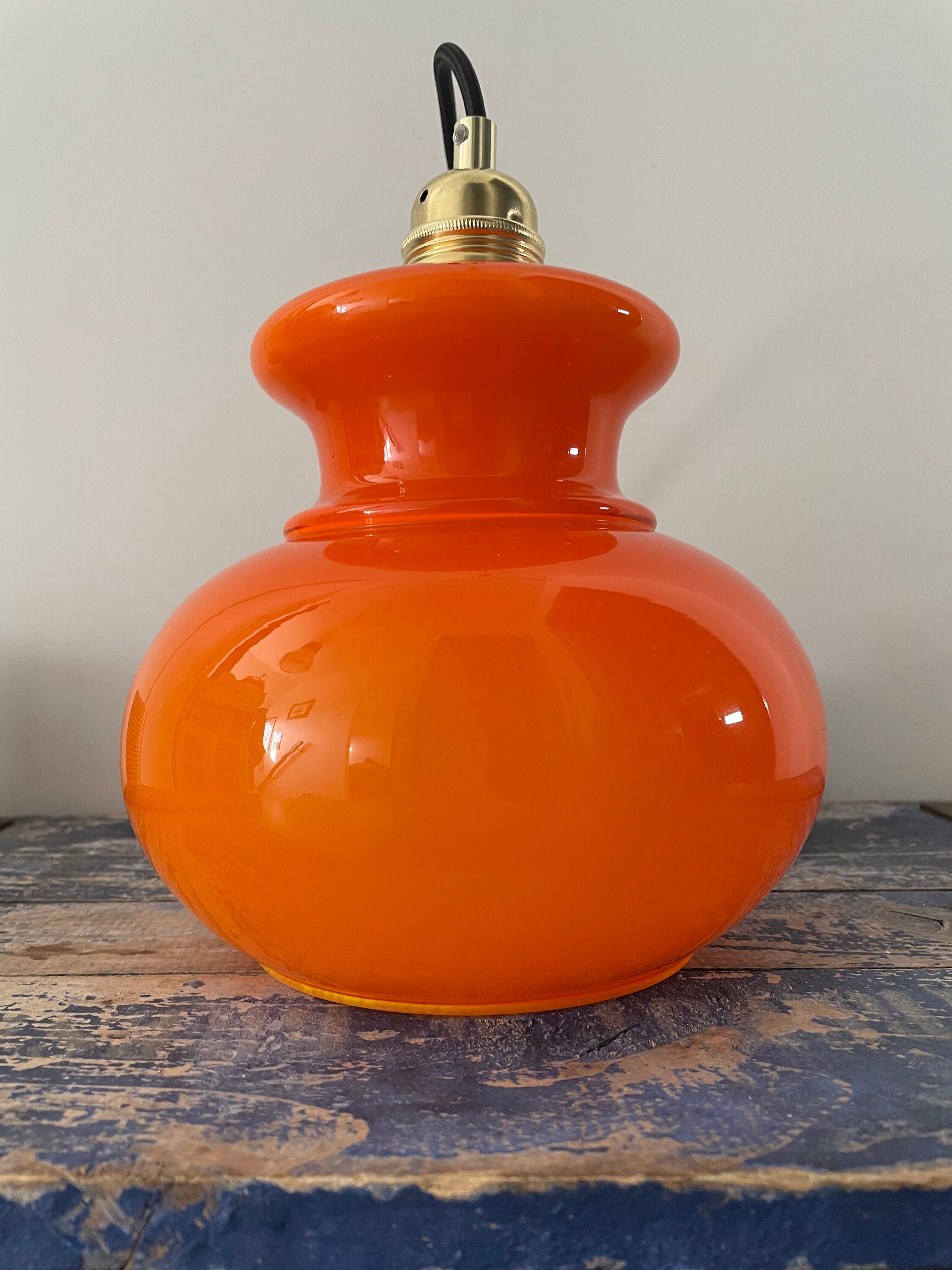 Vintage pendant lamp in electrified orange opaline to nine