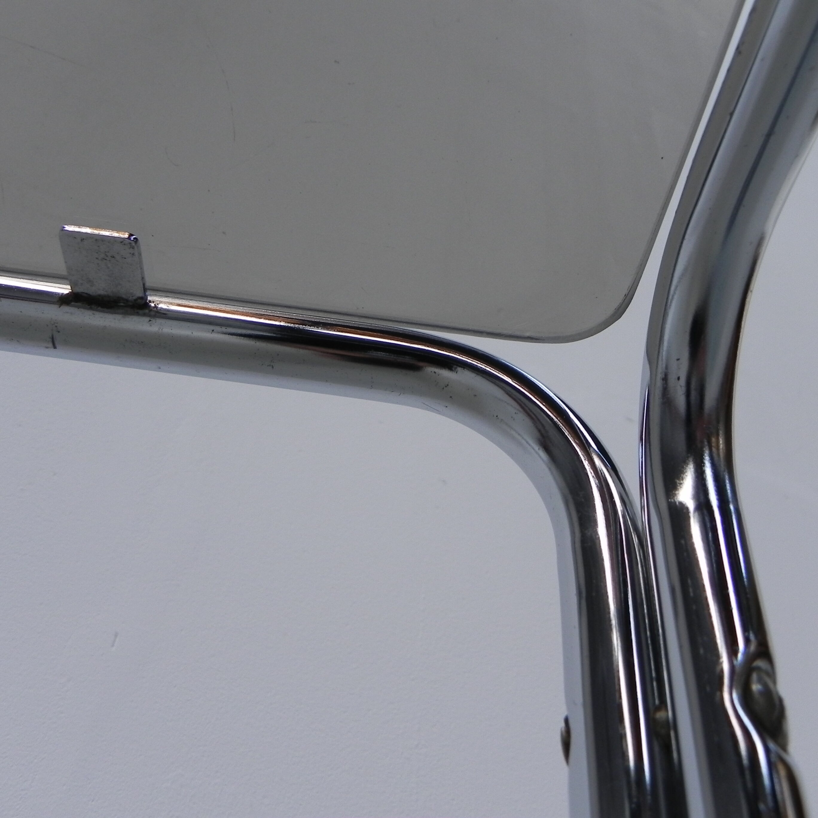 Coffee table with smoked glass top in chromed frame